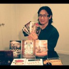 Dharma books and Buddha Shakyamuni pendant that H.E. Tsem Rinpoche sent to Canada for Jim Yeh.