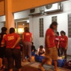 Erik Yeh and Jim Yeh volunteering at the Kechara Soup Kitchen food distribution in Malaysia.